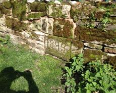 IMG_1100 Stone in the wall of Lapworth churchyard on the site of the old 'almshouses'