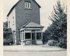 LHG01_0010 Building at the corner of Old Warwick Road and Station Lane, a general store with the former telephone exchange above. 1950s